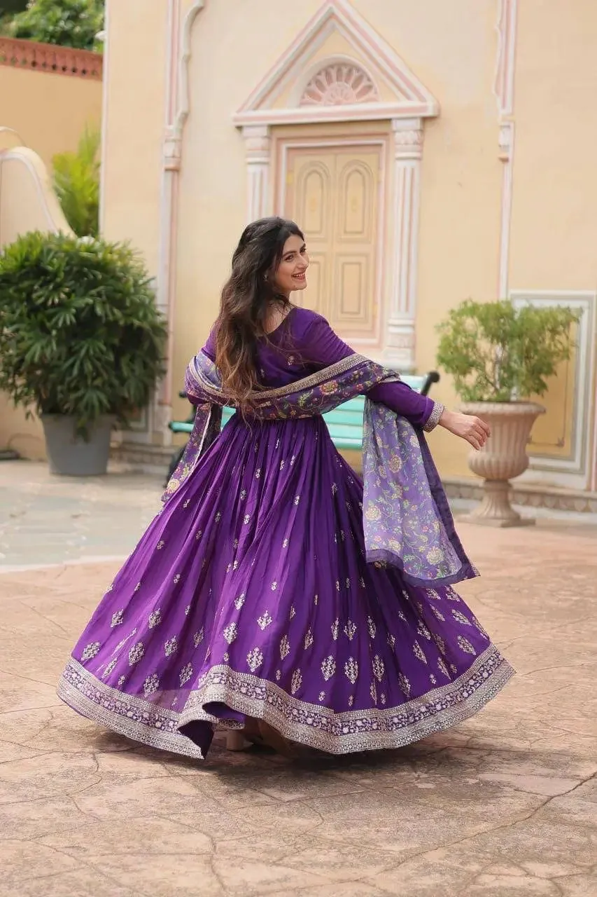 Get ready to shine with these stunning outfit Made from Chinon And Sequins Embroidered Work gown