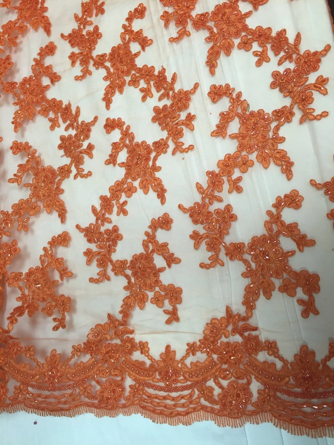Orange flower tiara design embroider and beaded on a mesh lace-prom-nightgown-decorations-dresses-sold by the yard.