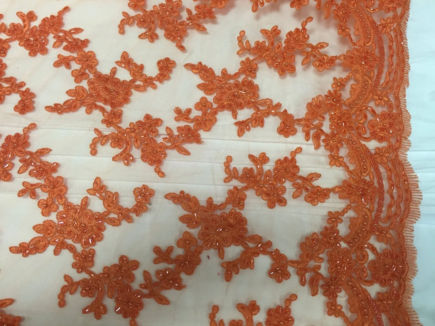 Orange flower tiara design embroider and beaded on a mesh lace-prom-nightgown-decorations-dresses-sold by the yard.