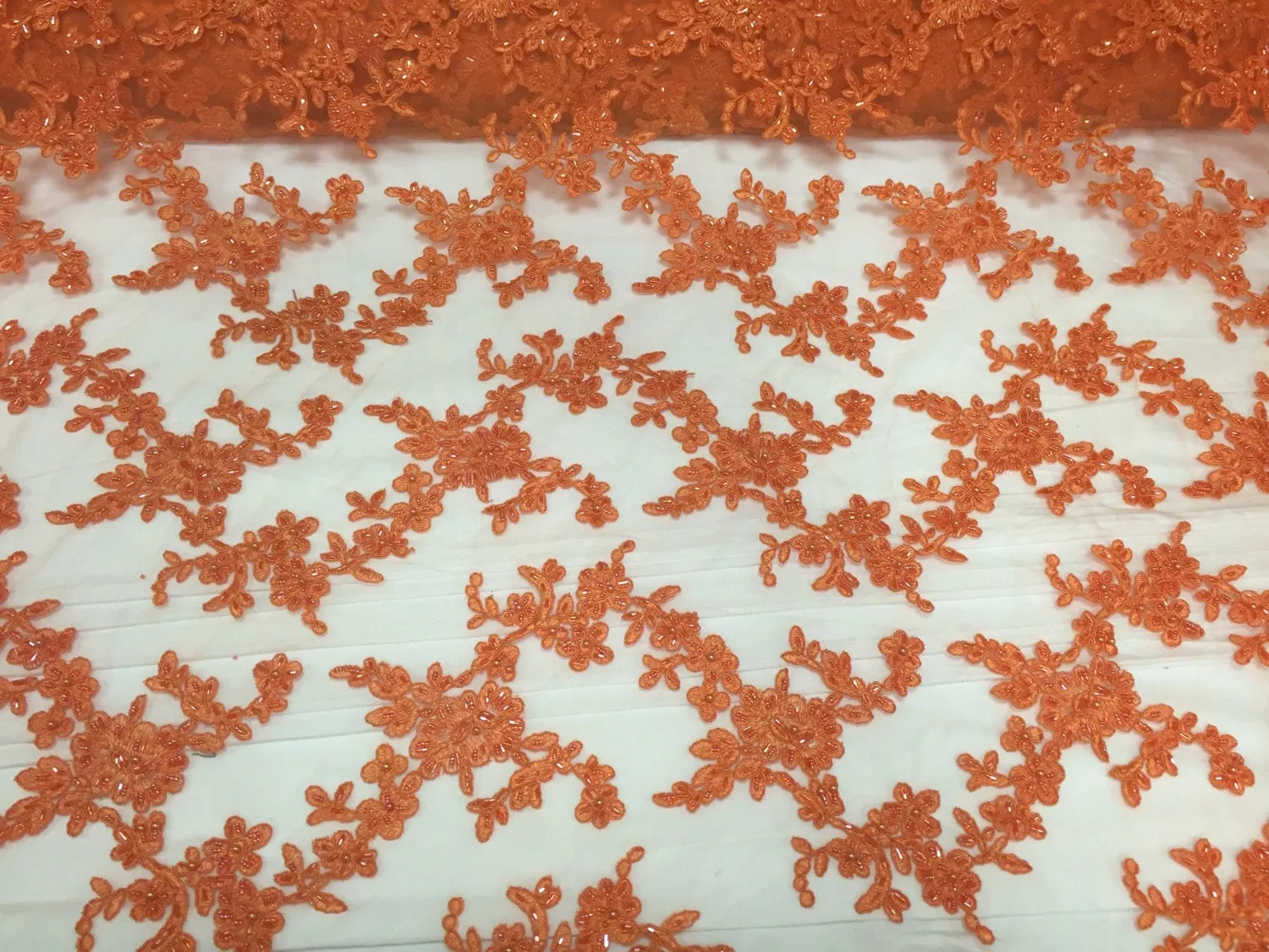 Orange flower tiara design embroider and beaded on a mesh lace-prom-nightgown-decorations-dresses-sold by the yard.